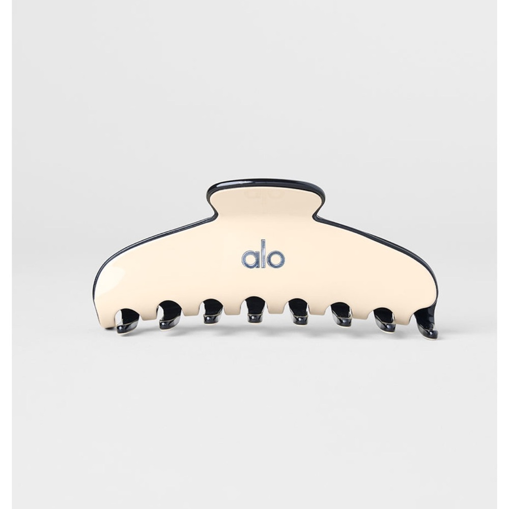 ALO Yoga Cream and Black Hair Clip